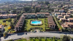 [pool and terrace overlooking the lake] Elen's house - Image 4