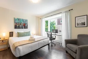 Luminous Haven 2BR: AC & Free Parking - Image 2