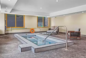 1BR Canmore Charm | Balcony, Hot Tub Bliss Near DT - Image 4