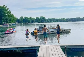 Randall Lake property w beach, kayaks & dock - Image 4