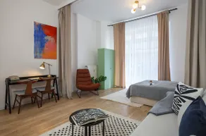 Serene Haven: 3BR Apt with Light Tones and Artwork - Image 3