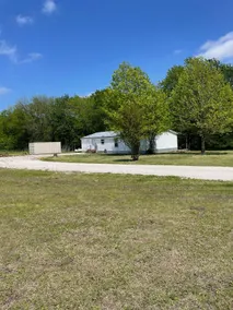 Totally remodeled on 7 acres. - Image 3