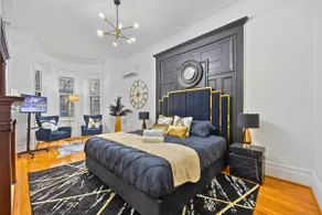 1 Min to Subway: King Bed, Luxe Airy Space + Patio - Image 3