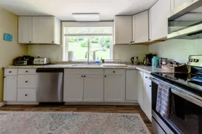 Scenic 4BR Home • 3 Baths • 2 Kitchens • + Parking - Image 2