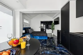 Elegant Jacuzzi Suite • Black & Blue Decor • Sleeps 2 - Image 3