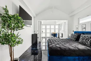 Elegant Jacuzzi Suite • Black & Blue Decor • Sleeps 2 - Image 4