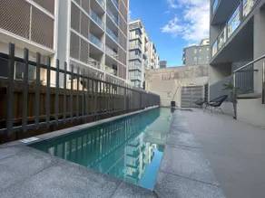 Modern 3BR Riverside APT w Parking near Shops and Park - Image 5