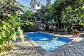 Green View 1BR with Pool 1min Walk to Morjim Beach - Image 4