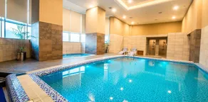 1-BHK Grand Skyline Corner Suite by Walk-Inn - Image 4