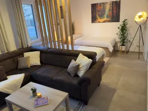 Modern apartment with forest flair and coffee enjoyment - Image 3