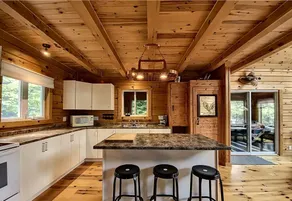 Lakefront log cabin with private dock - Image 3