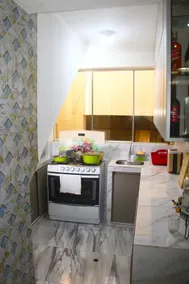 cozy modern apartment with equipped kitchen and wifi. - Image 3