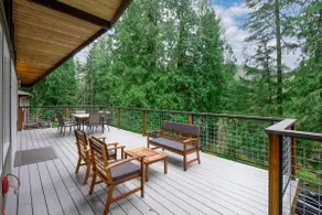 Forest Retreat with Two Kings and Expansive Deck - Image 3