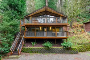 Forest Retreat with Two Kings and Expansive Deck - Image 2