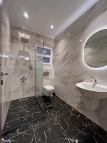 Three-Bedroom Deluxe Apartment - Image 4