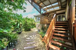 Stay in the village | Lush garden | Balcony dining - Image 2