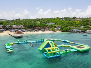 Sunset at ArecaHomes Beach Access Pool and Water Park - Image 4