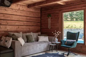 A year-round, covered, heated swimming pool and a hot tub. - Image 4