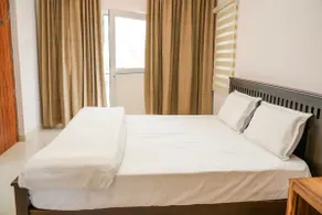 Sun Bright Inn Ooty • 3BHK • Hill View • Kitchen - Image 5