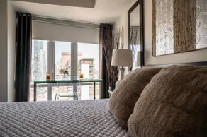 Take in Panoramic City Views from a Sophisticated Condominium - Image 3