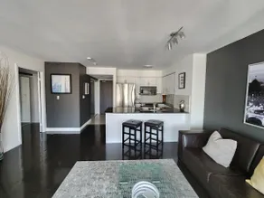 Take in Panoramic City Views from a Sophisticated Condominium - Image 2