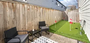 Walkable Heights 3BR Townhome + Putting Green - Image 2