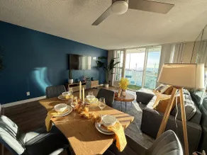 Sandy Beach Getaway w/ Balcony, Pool, & Parking - Image 2
