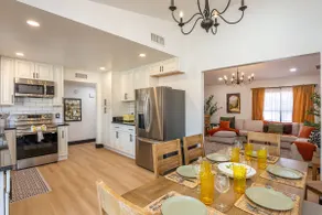 An oasis featuring a pool, where quiet luxury meets backyard tranquility. - Image 4