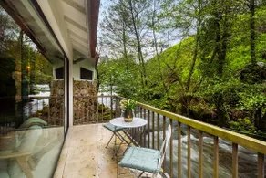 WHome Riverfront Retreat with Exclusive Waterfall Views - Image 5
