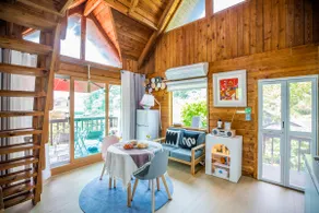Casabella Jstay, a pretty, emotional, private pension with a garden/2-story wooden house with a blue lawn - Image 2