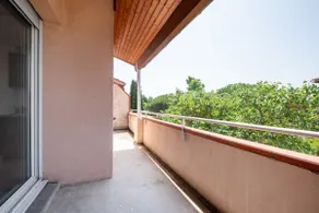 2-room apartment balcony with secure and free parking - Image 5