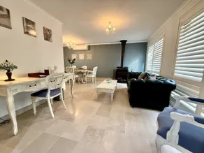 Stylish and family friendly with a cozy fireplace - Image 4