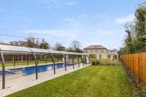 Joy Lane Mansion, Luxe Stay, Poolside Fun & Comfort - Image 4