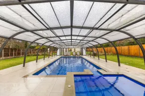 Joy Lane Mansion, Luxe Stay, Poolside Fun & Comfort - Image 3