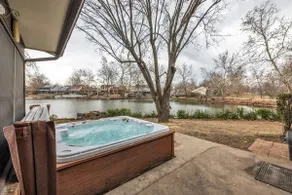 4BR Retreat w/ KING Bed, Hot Tub & Prime Location - Image 3