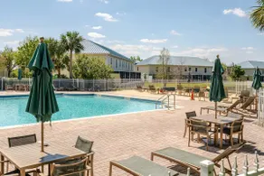 Chic Pink 2BR | Pool · Patio · Gym · Free Parking - Image 2