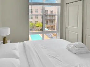 Poolside Luxury | Gray 2BR/2BTH in Prime Arlington - Image 3