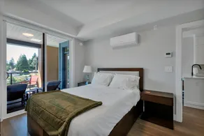 One-Bedroom Condo with Balcony and Mountain View - Image 4