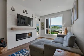 One-Bedroom Condo with Balcony and Mountain View - Image 2