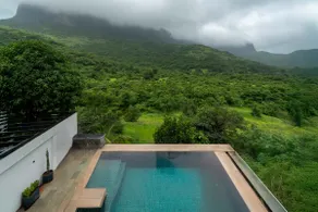 StayVista's Bael Leaf - 4BHK Villa with Infinity Pool & Home Theatre - Image 2