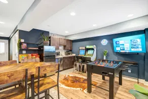 Stylish 4BR Townhome | Parking & Game Room - Image 3