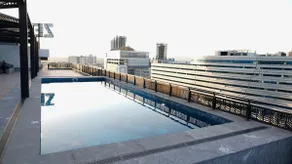 Cozy 1BR| Infinity Pool IWorkspace+Wifi+Parking. - Image 3