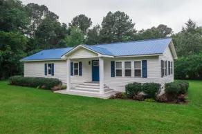 The Golf House @ by Land O' Lakes | Whiteville, NC - Image 2