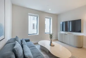 Bright & Modern 2BR | Golden Square Mile - Image 2