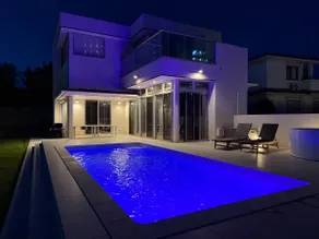 You can enjoy a private tennis court, heated pool, hot tub, sauna, and BBQ. - Image 2