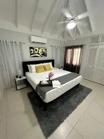 The Sunshine 3BR Villa Near Ocho Rios with Pool, Gym and Beach Access in Gated Community - Image 3
