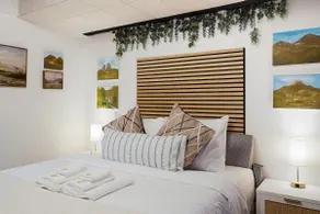 Beach Block 2-Bed with Coastal Palm Trees and Yard - Image 2