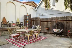 Beach Block 2-Bed with Coastal Palm Trees and Yard - Image 3