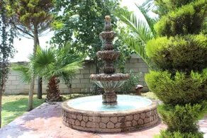 Family House with Private Garden, Fountain, and Grill - Image 3