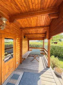 Log cabin at the sailing harbor - Image 3